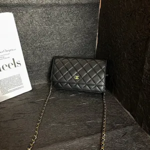 Chanel Black Gold WOC Crossbody Bag Quilted Leather Chain Strap